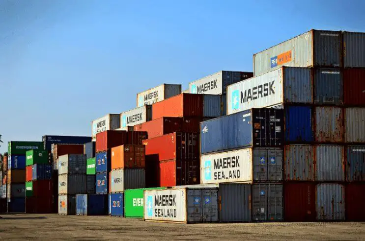 Shipping containers lined up at the port, ready for shipment